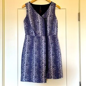 Blue Animal Print Cocktail Dress. Size 8, Front Zipper Detail.